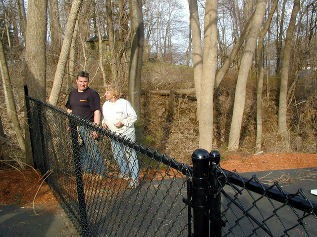 Sandy posing with Chris the owner of Able Fence